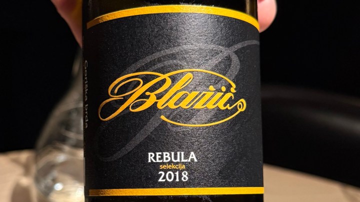 Label of Blazic Rebula selekcija 2018 wine, featuring a black background with gold accents.