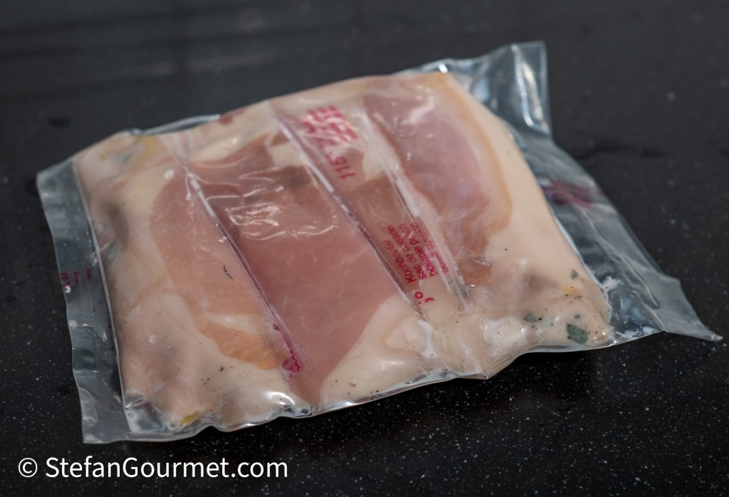 Vacuum-sealed rolls of guinea fowl breast fillets prepared for sous vide cooking.