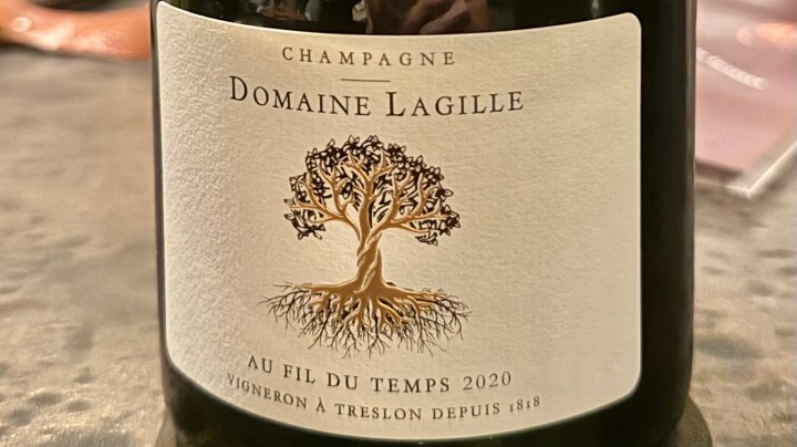 Label of Domaine Lagille Champagne 'Au Fil du Temps 2020' featuring a stylized tree design.