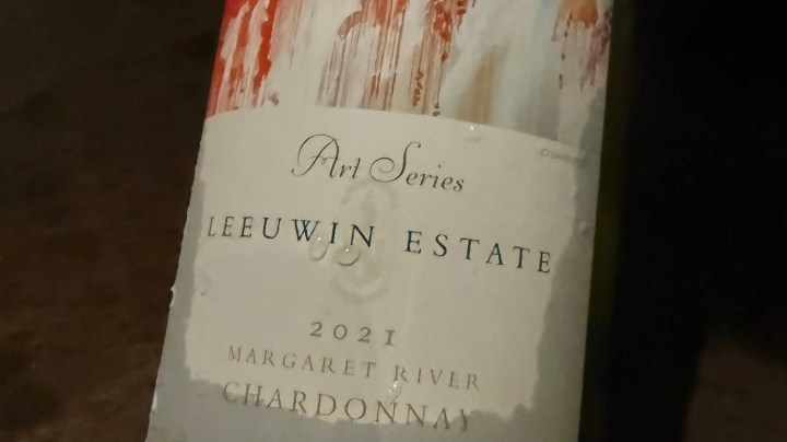 Close-up of a 2021 Leeuwin Estate Chardonnay wine bottle from Margaret River, featuring an artistic label design.