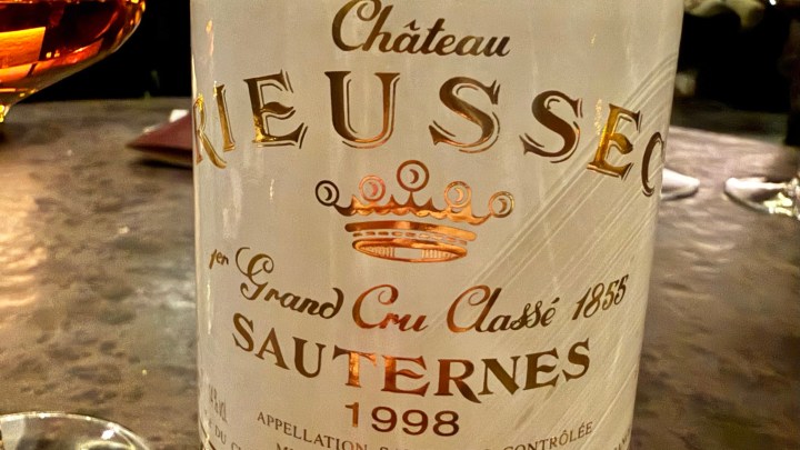 Close-up of a bottle of Château Rieussec Sauternes 1998, showcasing the label with the crown insignia and details of its classification.