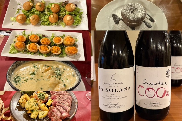 A platter of crispy croquettes served on lettuce leaves.