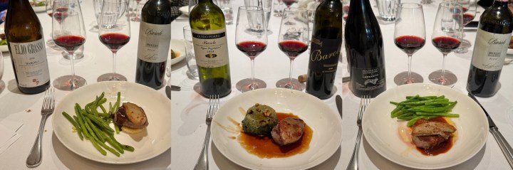 Three plates of gourmet dishes featuring cooked meat, green beans, and a side of stuffing on a dining table with various red wines in glasses.