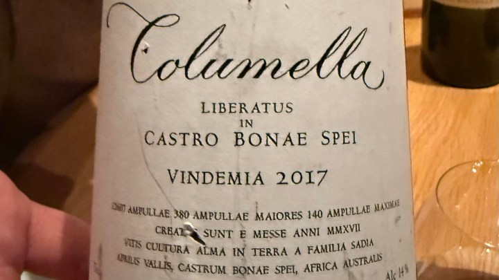 Close-up of a wine bottle label featuring the name 'Columella,' vintage year '2017,' and details about the wine's origin and production.