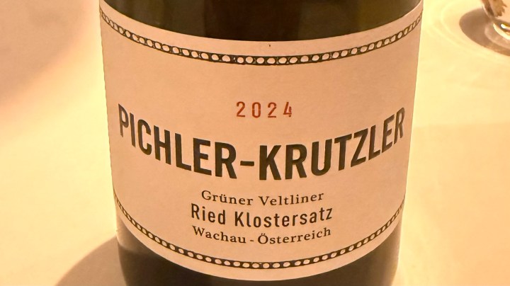 A close-up of a wine bottle label featuring 'Pichler-Krutzler', a 2024 Grüner Veltliner from Ried Klostersatz, Wachau, Österreich.